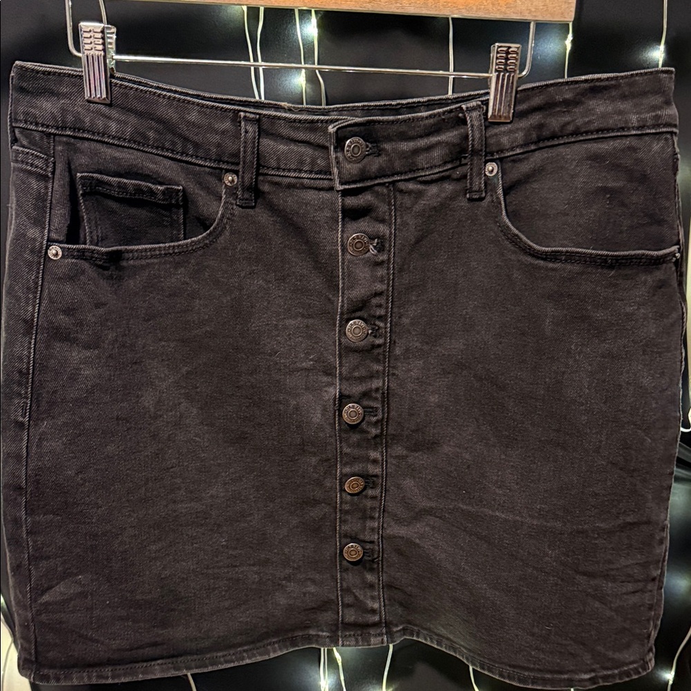 28. Pre loved Old Navy Black Button-Front Mini Skirt
